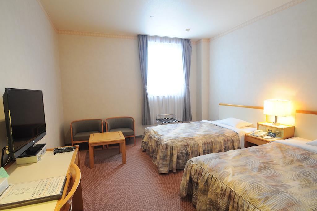 Hotel Sapporo Sun Plaza Quarto foto
